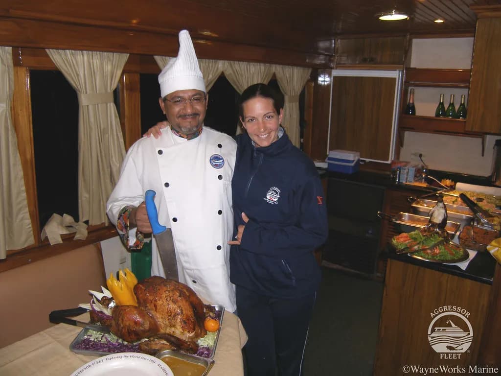 Chef presents dinner aboard the Galapagos Aggressor III Liveaboard