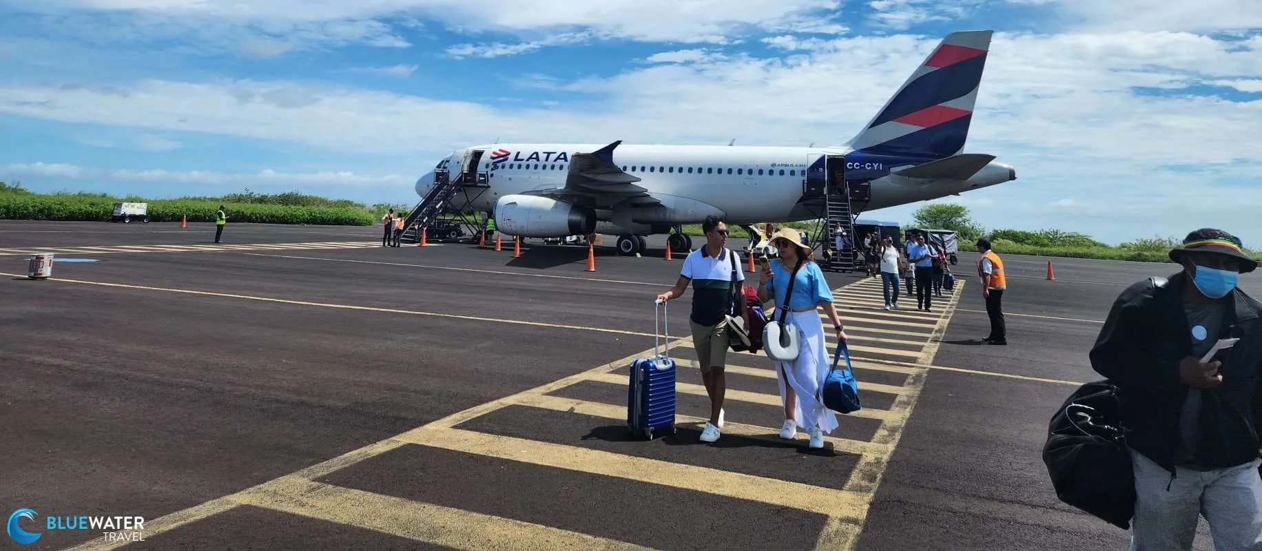 People walk away from a small airplane on a tarmac. People walk away from a small airplane on a tarmac.