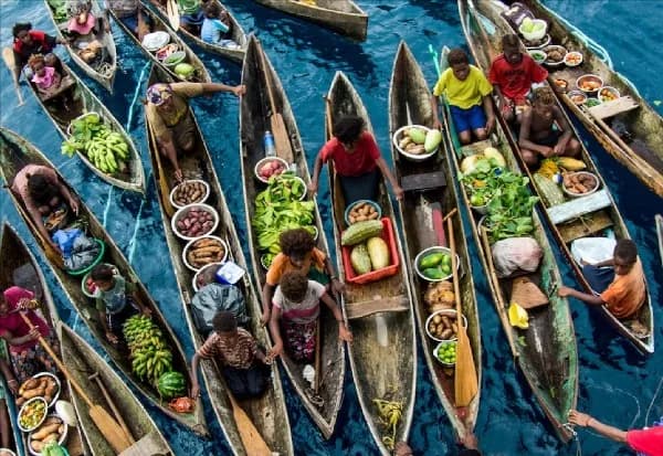 An aerial view of a floating market in the Solomon Islands