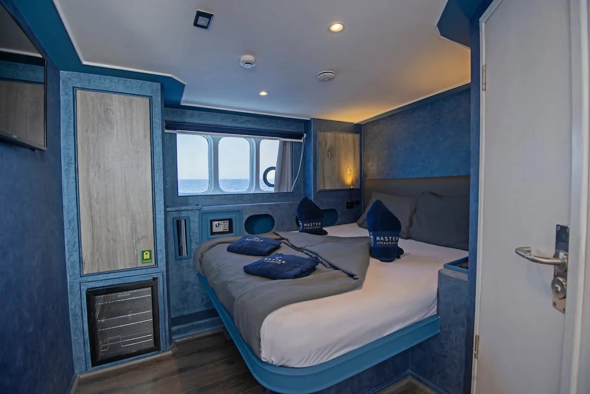 Premium Double Cabin with large bed and windows