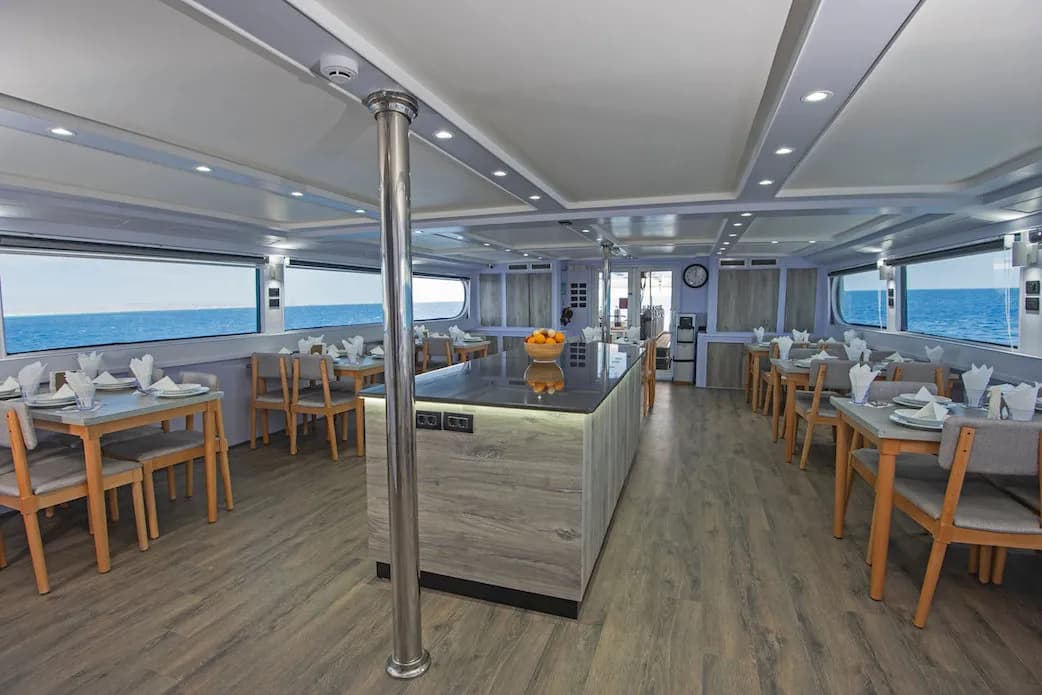 Indoor dining area with tables and chairs