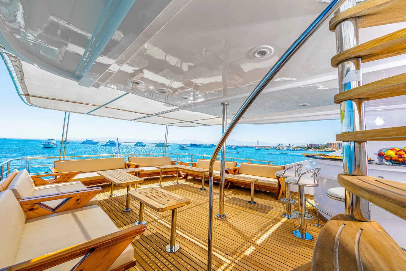 Breezy lounge area with couches and tbales