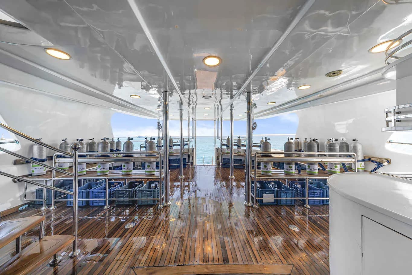Dive deck with scuba tanks neatly arranged