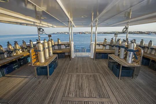 Shaded dive deck with scuba tanks