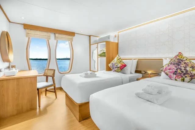 King bed and double bed with big ocean-view windows