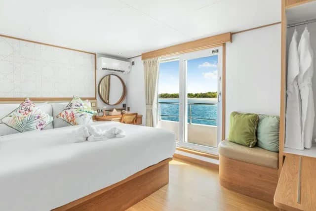 King bed with large sliding glass doors