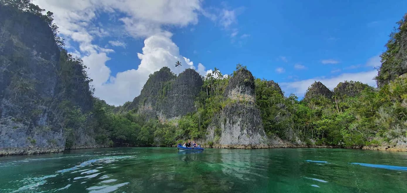 Dive tender with the Indonesian landscape as background