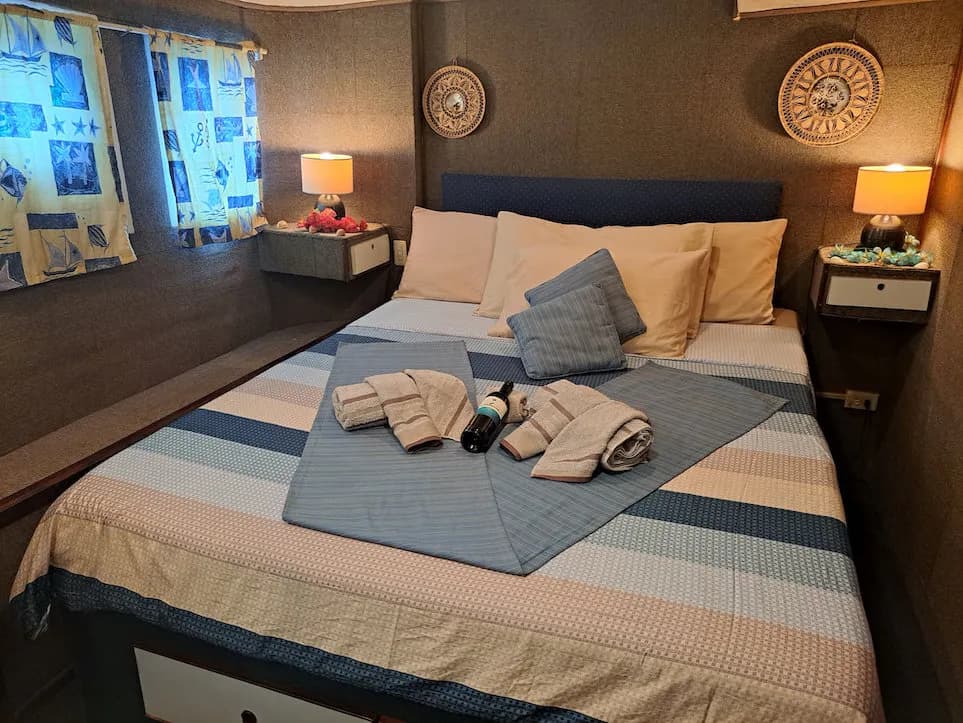 The comfortable SS Thorfinn cabin with a large bed