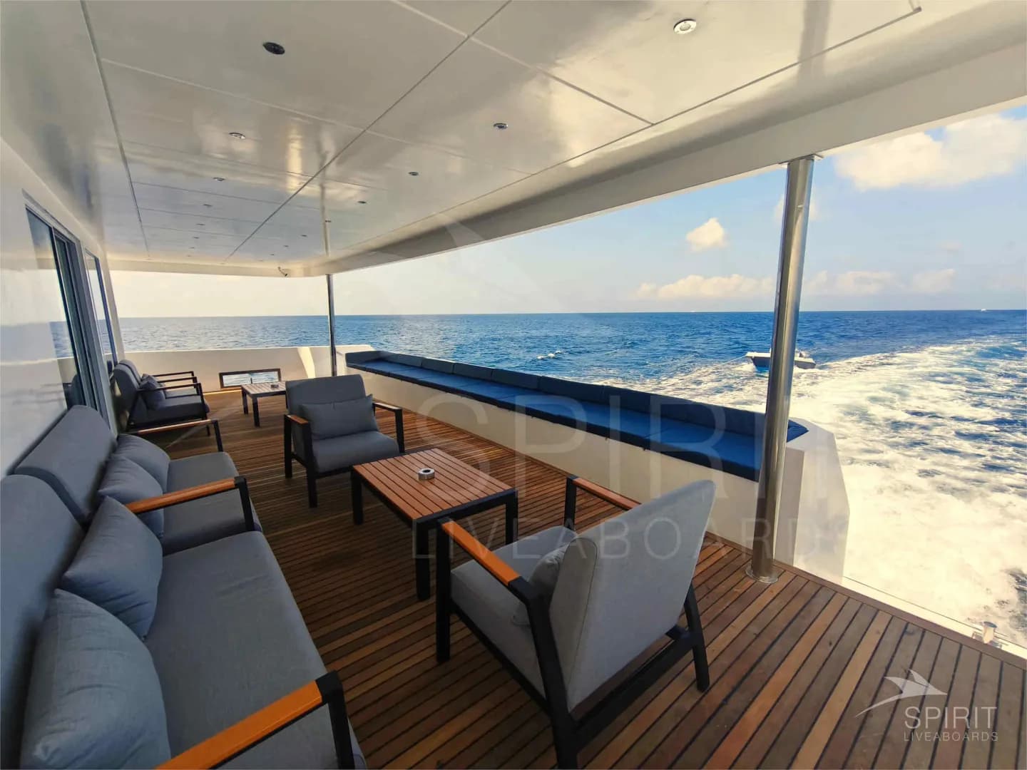 Shaded lounge area with couches