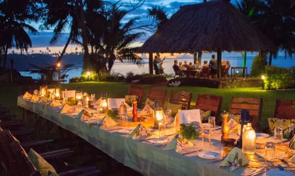 A long table set for dinner at Paradise Taveuni