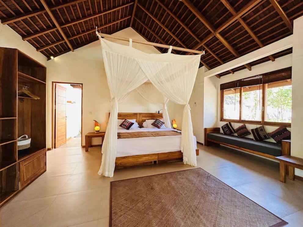 A modern interior of an Oceanfront Bungalow at Alor Tanapi Dive Resort.