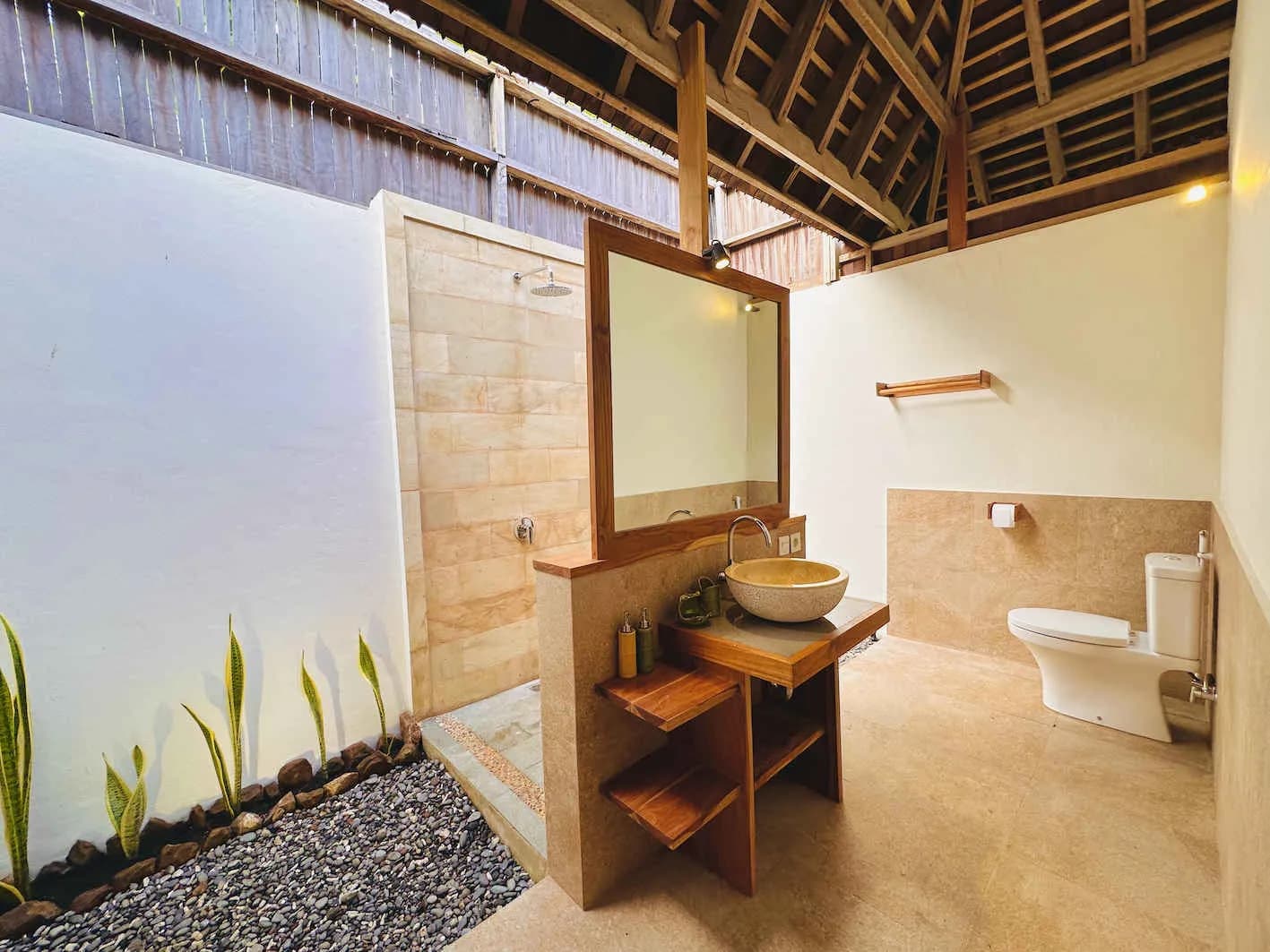 A modern bathroom in a Hillside Bungalow at Alor Tanapi Dive Resort.