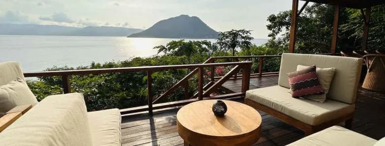 A lounge area overlooks the Pantar Strait at Alor Tanapi Dive Resort.