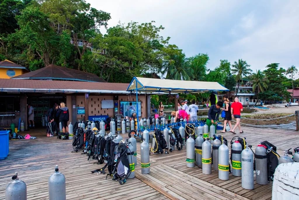 Scuba cylinders and equipment are prepared for diving at El Galleon