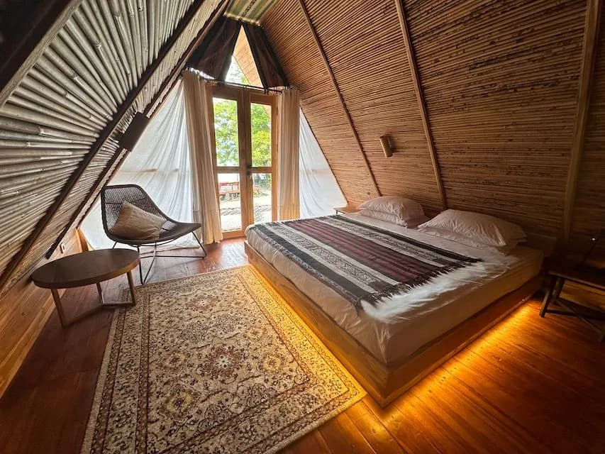 Moko Alor Villas with a large bed
